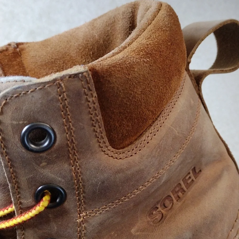 Sorel men's black rubber & tan leather winter boots. Size 11.5